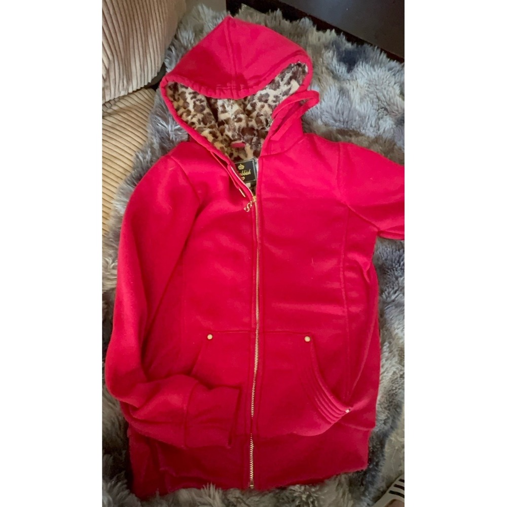 Used condition women's size large red and cheetah hooded jacket.
